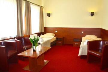Фото номера Трехместный номер Отели типа «постель и завтрак» Hotelik Amber г. Рашин 5